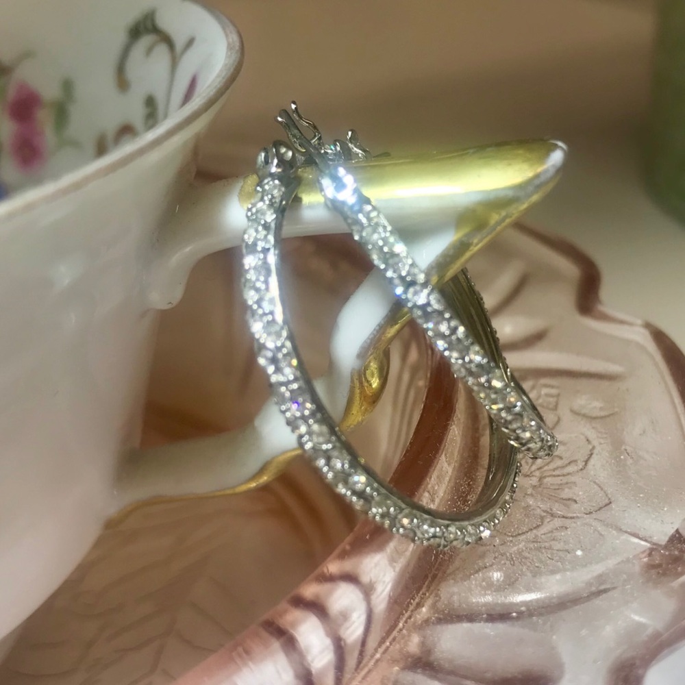 Silver cuz hoop earings 1”. Never worn